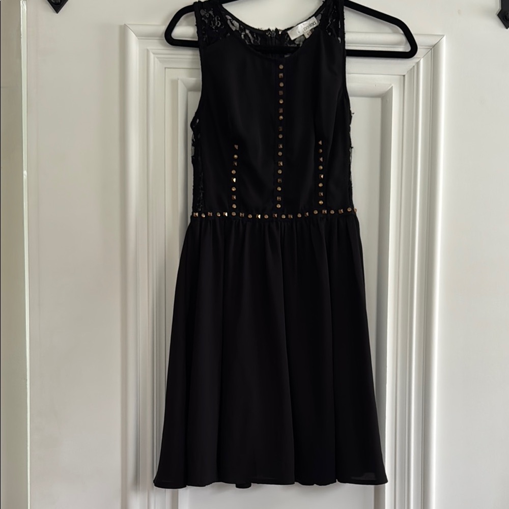 Elegant Black Dress with Studded Details